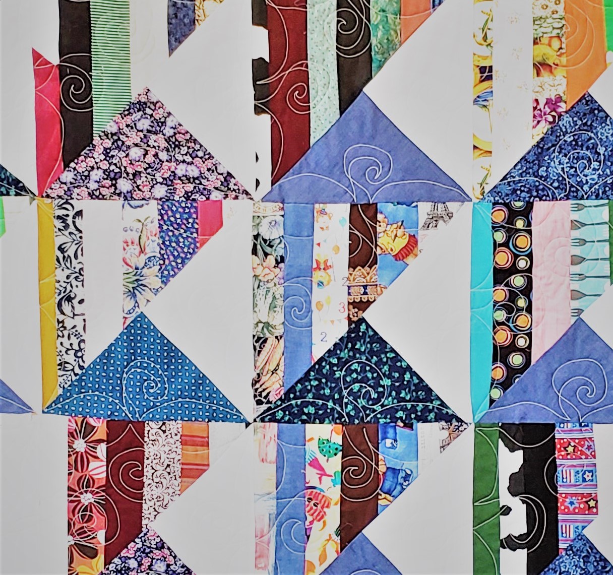 Quilt A Smile logo